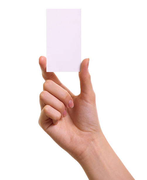 istock Paper card in woman hand isolated on white background 471609461