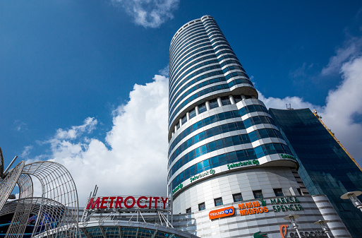 Istanbul, Turkey - February 18, 2013: The tower at the entrance of the Metro city shopping center also entrance of the metro station, in Levent district characteristic for the presence of contemporary architectures