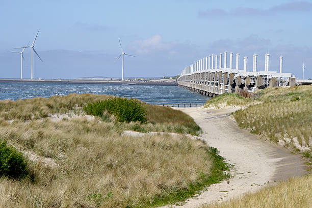 Dutch Oosterscheldekering, a storm surge barrier Dutch 9 kilometer long storm surge barrier to protect The Netherlands from the North Sea sluice photos stock pictures, royalty-free photos & images
