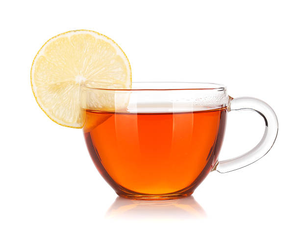 istock Glass cup of black tea with lemon slice 471613799