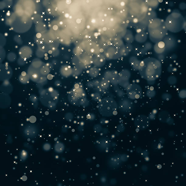istock glittering stars on bokeh background 471614138