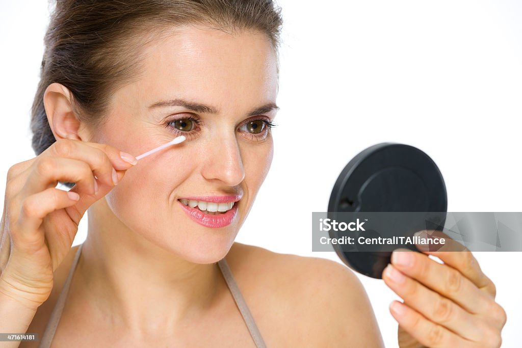 Beauty portrait of happy young woman using cotton swabs Adult Stock Photo