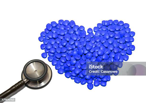 Doctors Stethoscope With Blue Drugs In Pill Form Stock Photo - Download Image Now - Cut Out, Doctor, Equipment