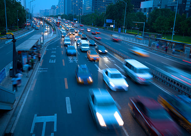 istock Rush hour traffic at night on multiple lane highway 471615951