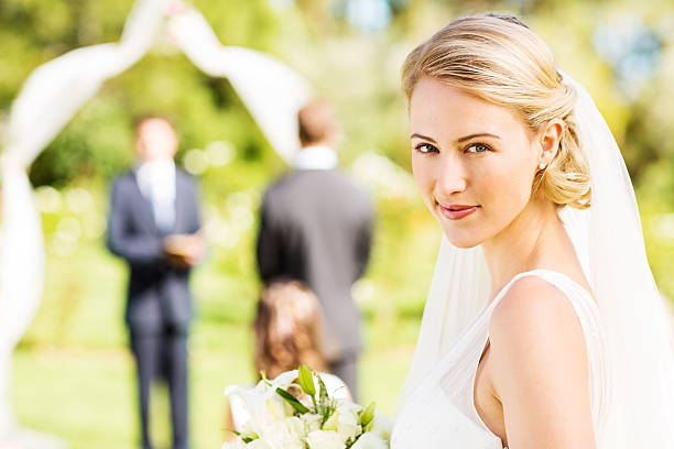istock Bride With Groom In Background Before Wedding Ceremony 471616179