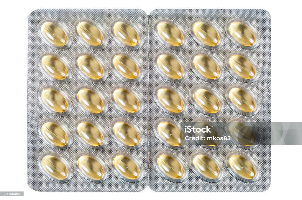 Cod liver oil capsules on white background Cod liver oil capsules isolated on white background with clipping path 2015 Stock Photo