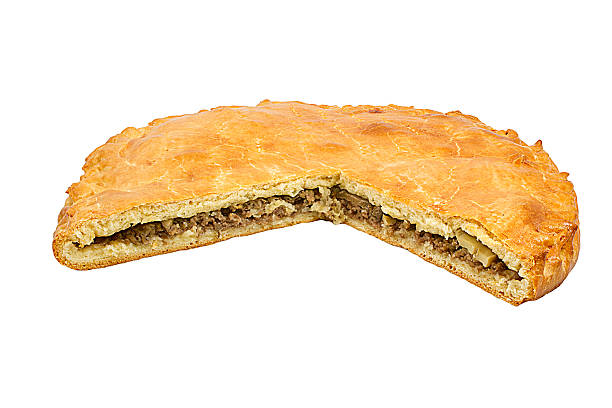 istock Savoury meat pie with a golden crust studio isolated 471616994
