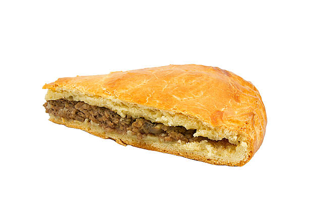istock Savoury meat pie with a golden crust studio isolated 471617002