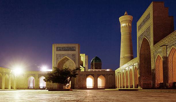 istock Night view of Kalon mosque and minaret - Bukhara 471617832