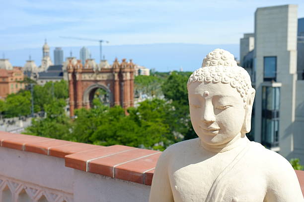 Buddha in Barcelona on the roof in Barcelone arc de triomf barcelona stock pictures, royalty-free photos & images