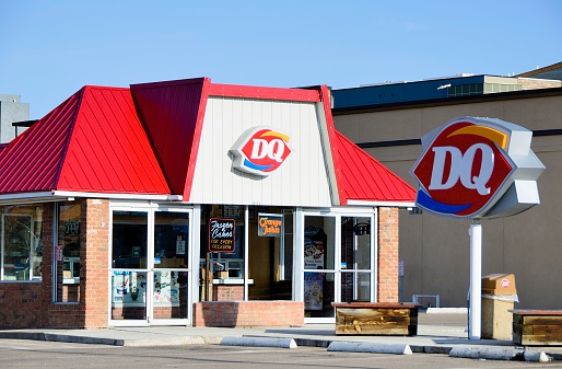 Fort Collins, Colorado, USA - May 5, 2013: The Dairy Queen on South College Road in Fort Collins, Colorado with customers inside. Founded in 1940, Dairy Queen is a chain that serves primarily ice cream and related products with over 5,700 locations.