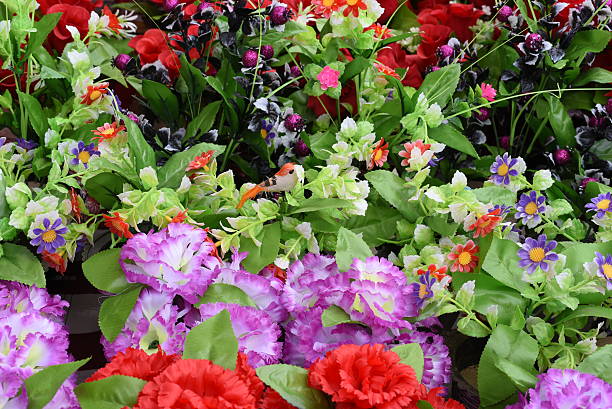 istock Bright and beautiful colors of plastic flowers 471620696