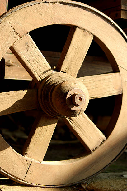 istock Old wooden wagon wheel. 471621417