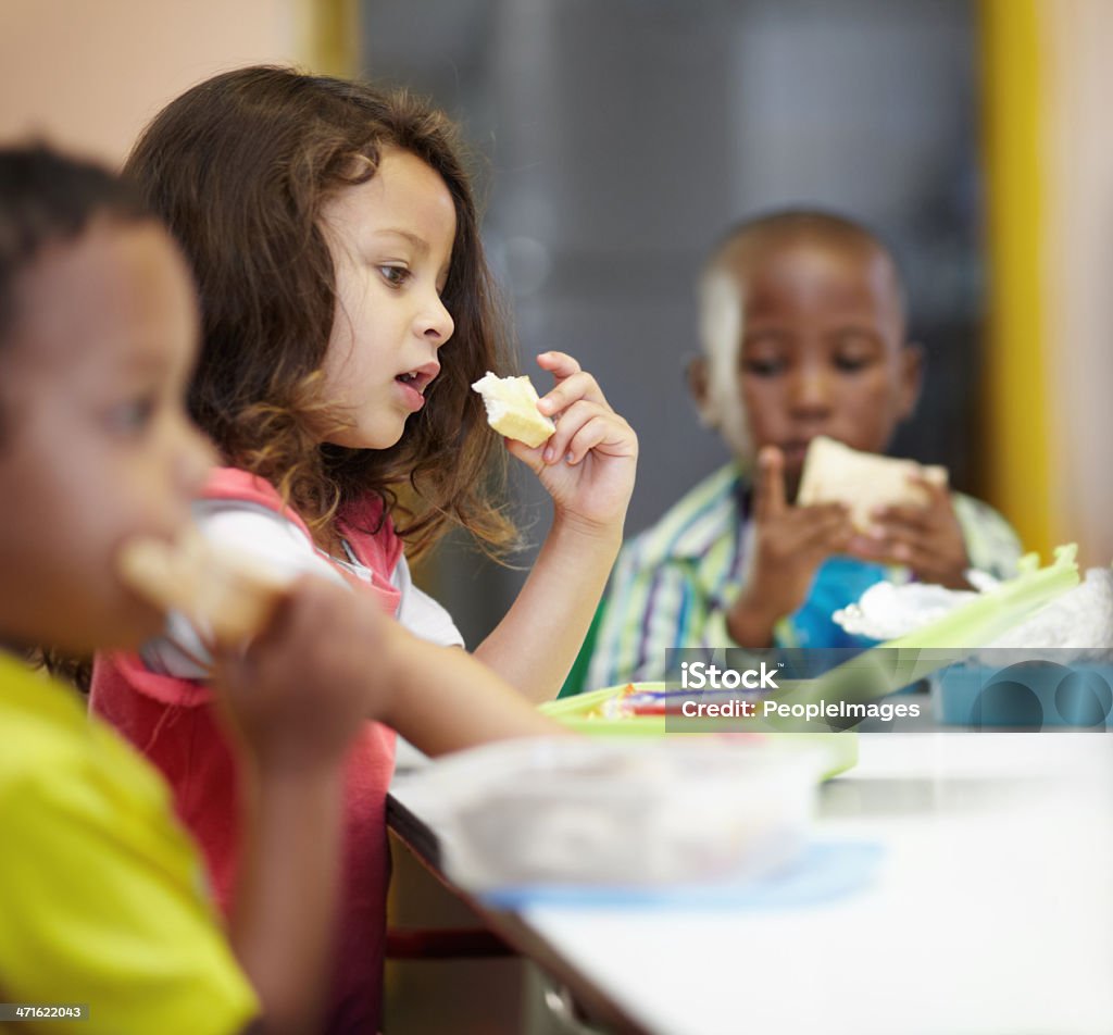 Break time Three children eating their lunch sandwicheshttp://195.154.178.81/DATA/i_collage/pi/shoots/781043.jpg Child Stock Photo