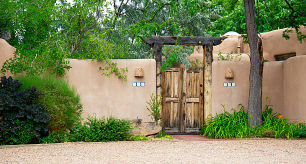 istock Entry Door to Southwest Santa Fe Adobe Stucco House 471623655