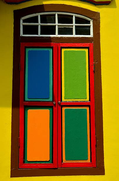 istock Colorful window shutters and glass pane windows 471624605