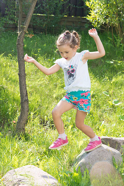 istock Young children running in a park 471624693