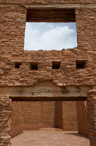 The mission church of La Purisima Concepcion in the Quarai ruins lies empty in central New Mexico.  Quarai is one of three distinctive parts of the Salinas Pueblo Missions National Monument and was once home to a thriving community.  Prior to the arrival of Don Juan de Onate in 1598, the area was the location of a large pueblo village.  Thereafter, with successive Spaniards bringing their faith to the area, Quarai remained inhabited until 1678, when disease, drought and Apache raids led to its abandonment.