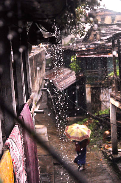 rainy day, a lady in narrow alley