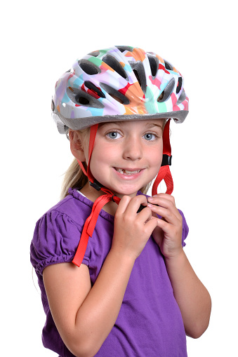 girl wearing a bicycle helmet