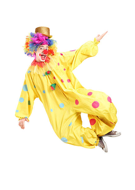 istock Male clown jumping 471628965