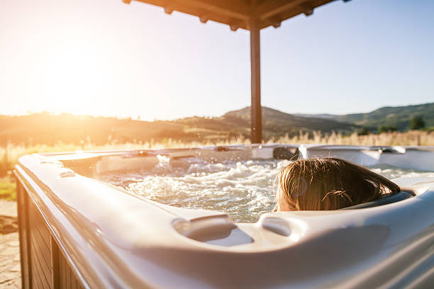 istock Woman in whirlpool hot tub 471629357