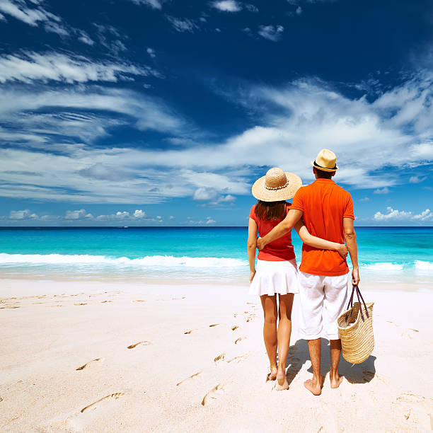 istock Couple on a beach at Seychelles 471630544
