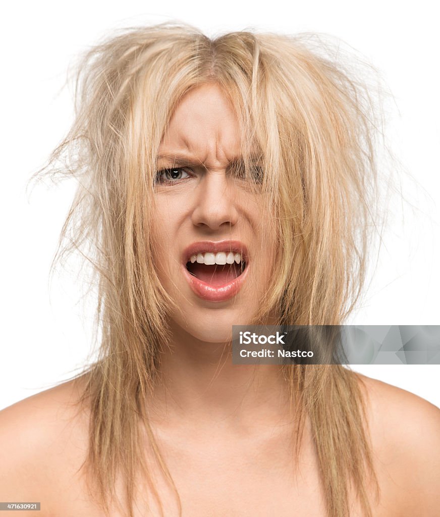Bad hair day Portrait of a preety young girl with messed up hair isolated on white background Tangled Hair Stock Photo