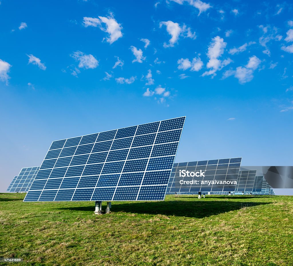 Solar power station Solar panels on a field Agricultural Field Stock Photo