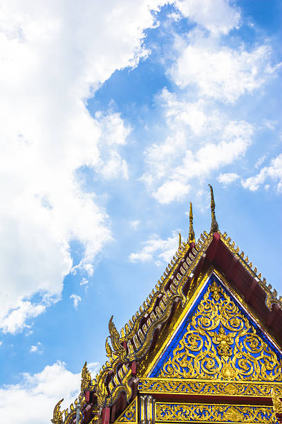 istock rooftop of temple thai on blue sky 471632617