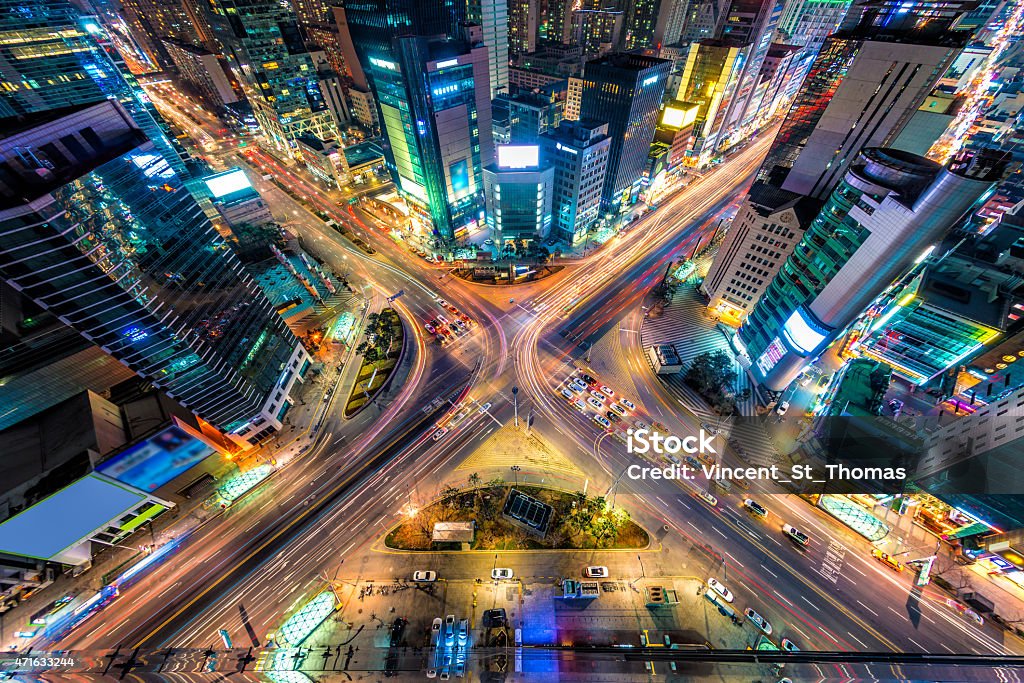 A view of the traffic in Seoul from above Night traffic zips through an intersection in the Gangnam district of Seoul, South Korea. Seoul Stock Photo