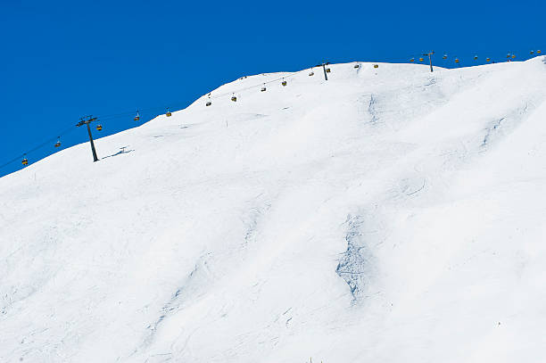 istock Chairlift along Ski Slope 471633375