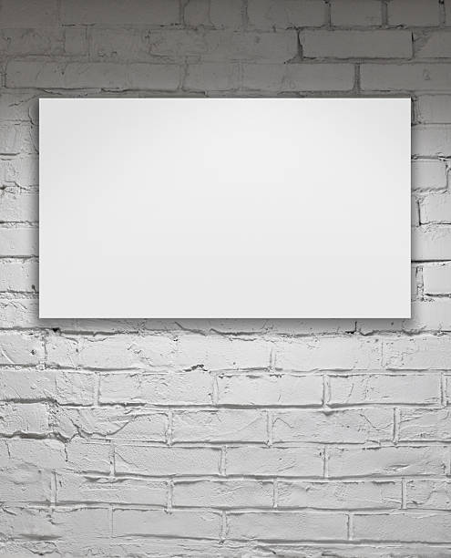 istock Image of blank billboard over white brick wall 471634107