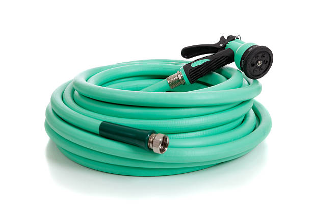istock Green Garden Hose with Sprayer 471634141