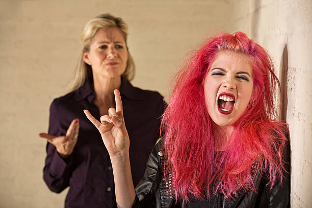 istock Sneering Parent and Loud Daughter 471635183