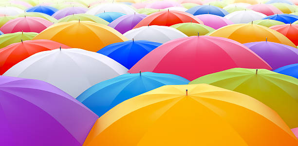 guarda-sóis de cores - rainbow umbrella descriptive color multi colored imagens e fotografias de stock