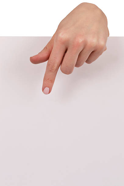 istock woman hand holding white empty board isolated over white 471637040