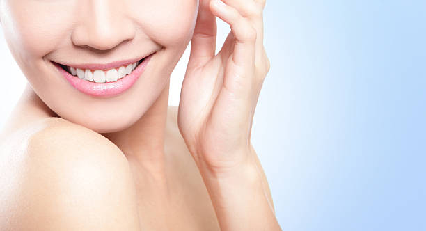 Beautiful young woman teeth close up