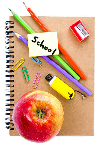 istock Back to school supplies with Notebook, red apple 471638359