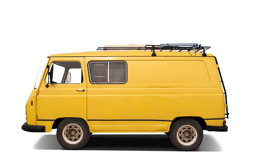 Small yellow van with roof rack