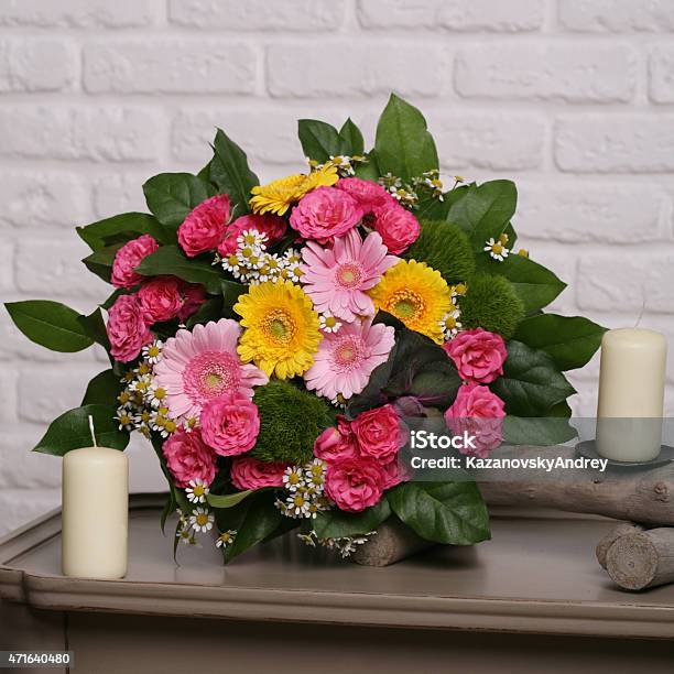 Floral Bouquet Of Gerberas Roses Field Daisies Green Leaves In Stock Photo - Download Image Now