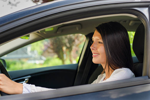 istock woman in car 471642367