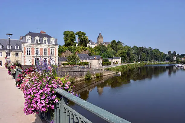 Port on Mayenne river at Château-Gontier with the Saint-Jean-Baptiste church in the background, commune in the Mayenne department, Pays de la Loire Region, in north-western France