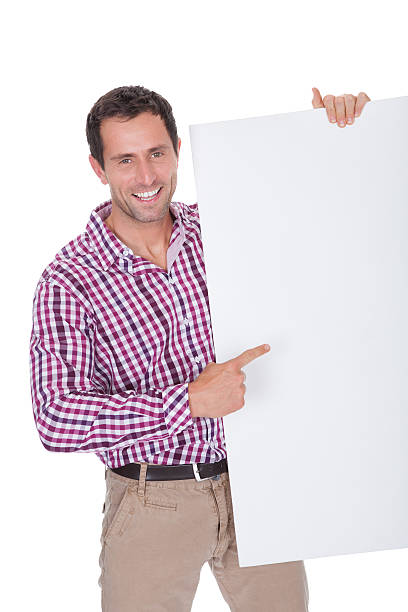 istock Portrait Of Young Man Holding Placard 471644445