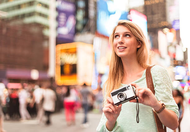 istock Photographer in times square - NYC 471646035