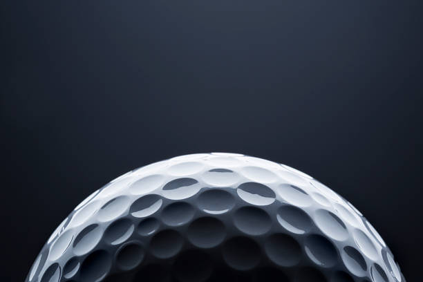 istock Macro golf ball on dark blue  background, space for text. 471646926