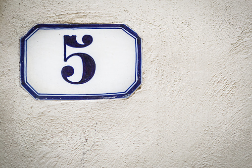 House number five (5) on white background