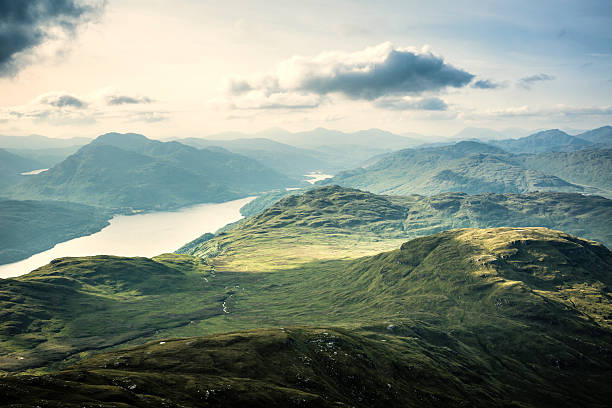 A summer view over the mountains north up Loch Lomond from Ben Lomond.