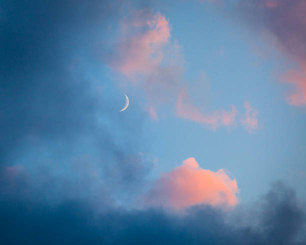 istock Pink clouds and moon heaven closeup 471648652