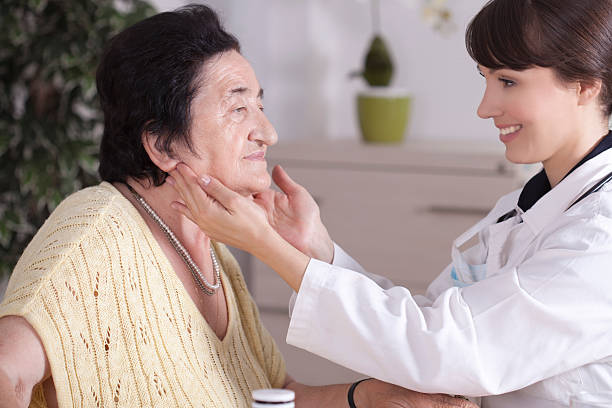 istock Elderly woman at doctor's office. 471648841